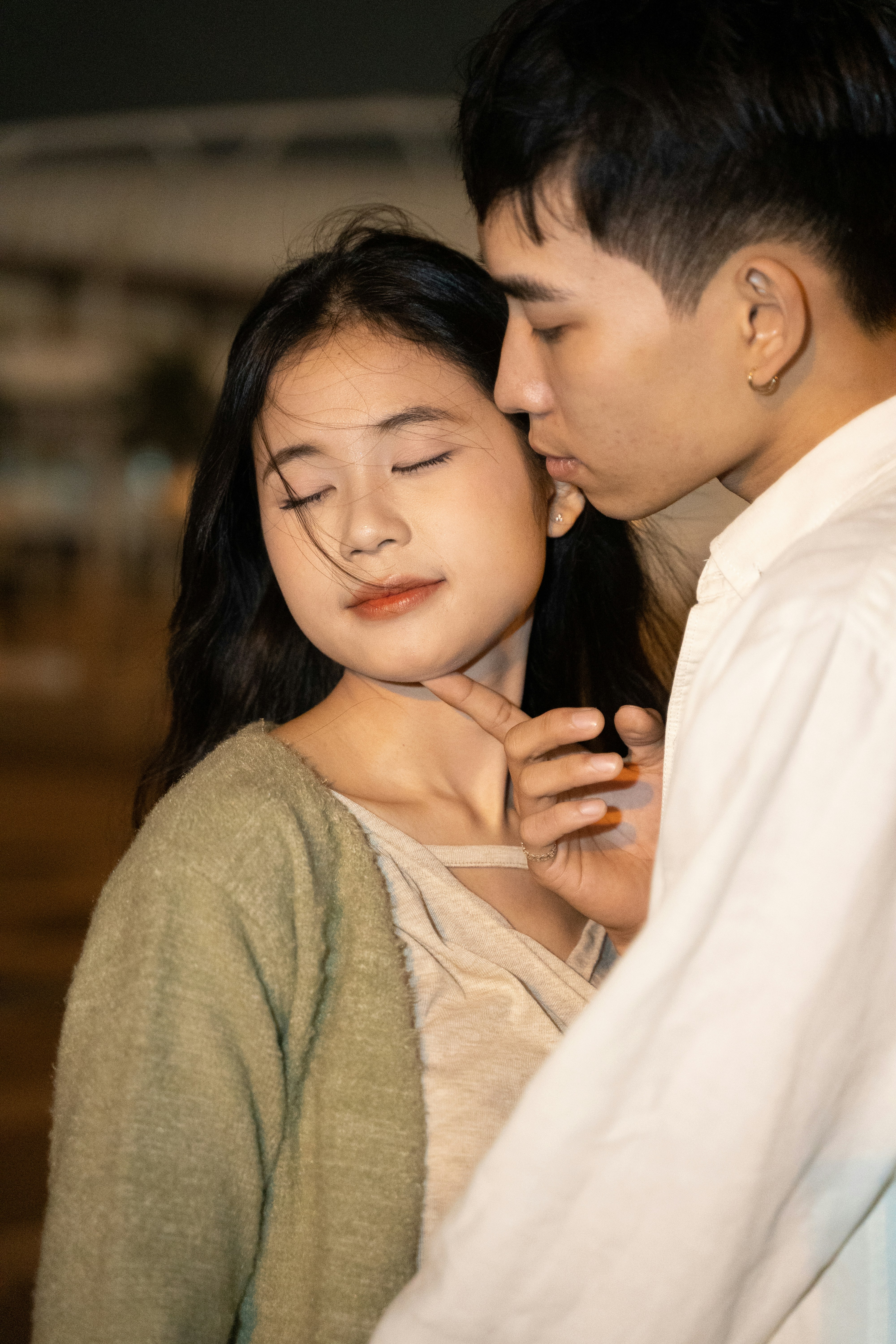a man and a woman standing next to each other